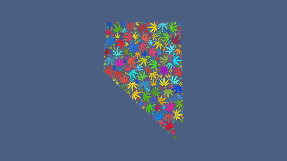 Nevada silhouette made from multicolored cannabis leaves on a muted blue background.