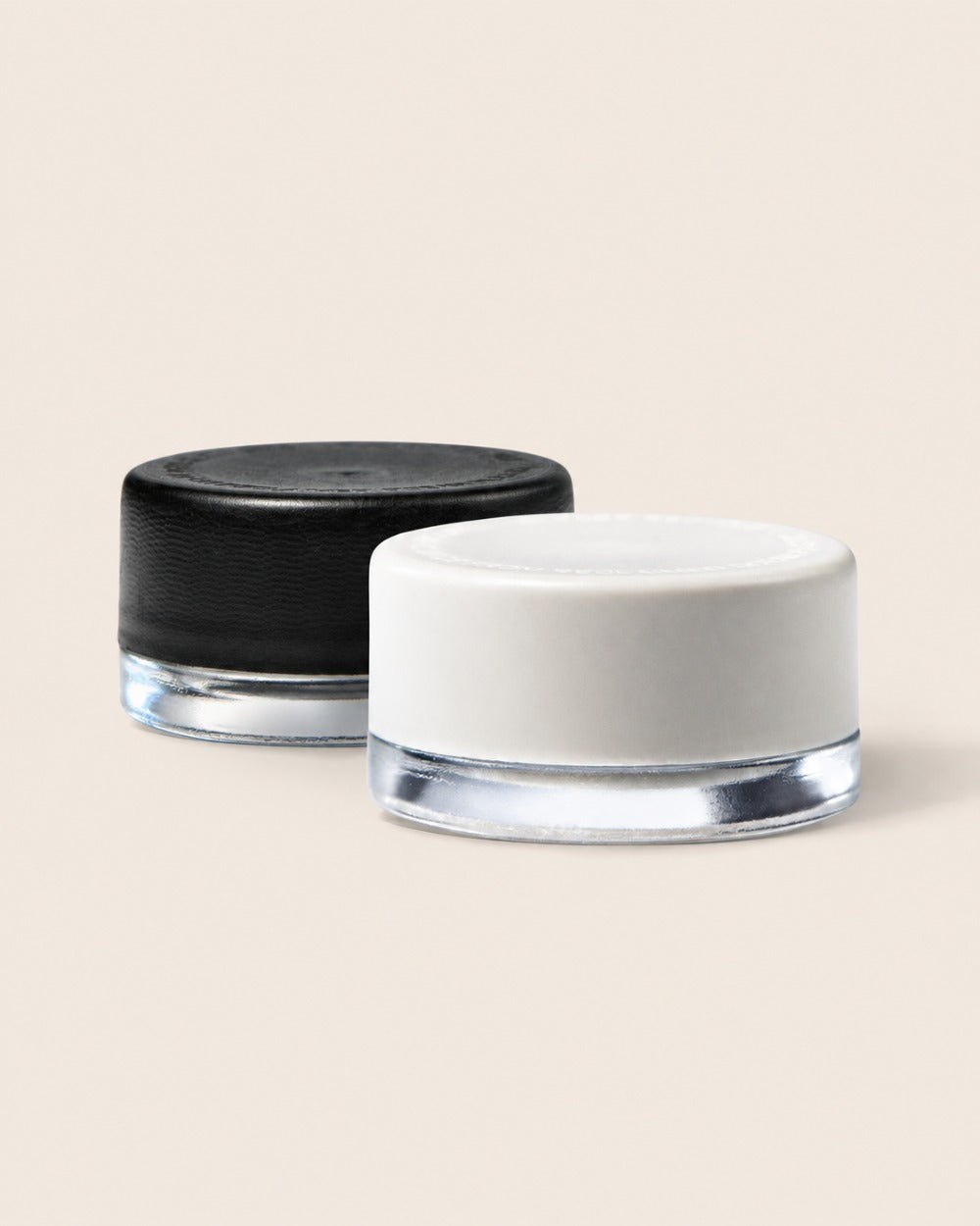 Black and white 38-400 Ocean Screw-Top Lids on 9ml glass jars